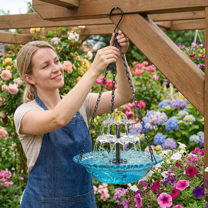 Mivoza solar bird bath fountain with two-tier garden water feature, no power needed, surrounded by lush greenery.