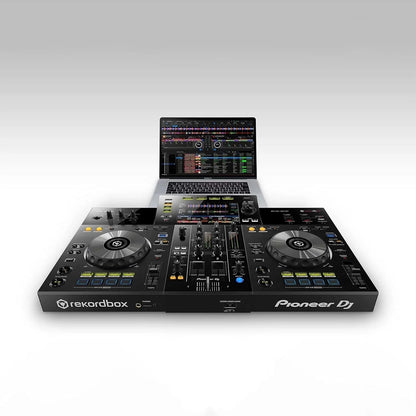 Casavibeo Pioneer DJ XDJ-RR all-in-one DJ system with dual jog wheels, mixer controls, and colorful LED lighting.
