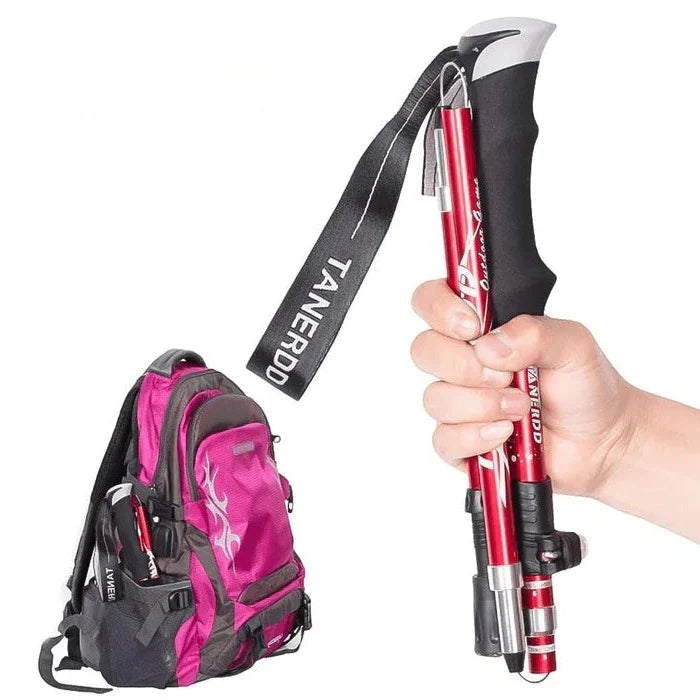 Belro adjustable trekking poles with foldable telescopic design, showing black handles and aluminum shafts for outdoor hiking.