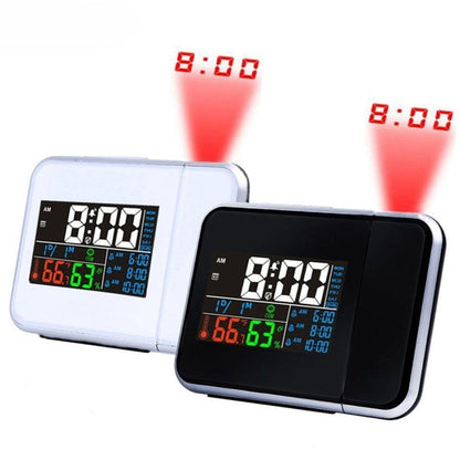 Colorful LED projection clock by Belro displaying time, temperature, humidity, and calendar on a wall or ceiling.