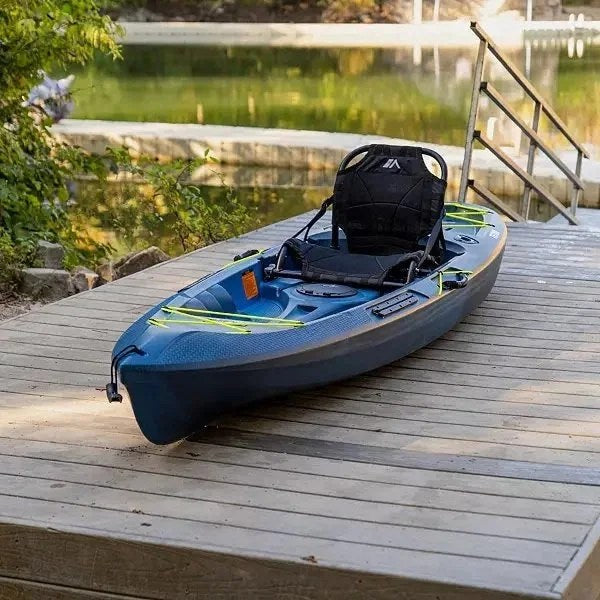 Casavibeo Quest Teton 100 kayak on water, showing its sleek design and bright color, perfect for outdoor kayaking adventures.