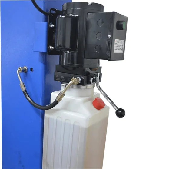 Casavibeo Titan HD2P-9000AC 2-post lift shown in a workshop setting with sturdy metal arms and safety features visible.