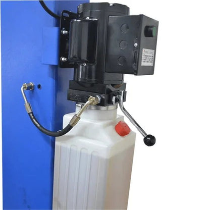 Casavibeo Titan HD2P-9000AC 2-post lift shown in a workshop setting with sturdy metal arms and safety features visible.