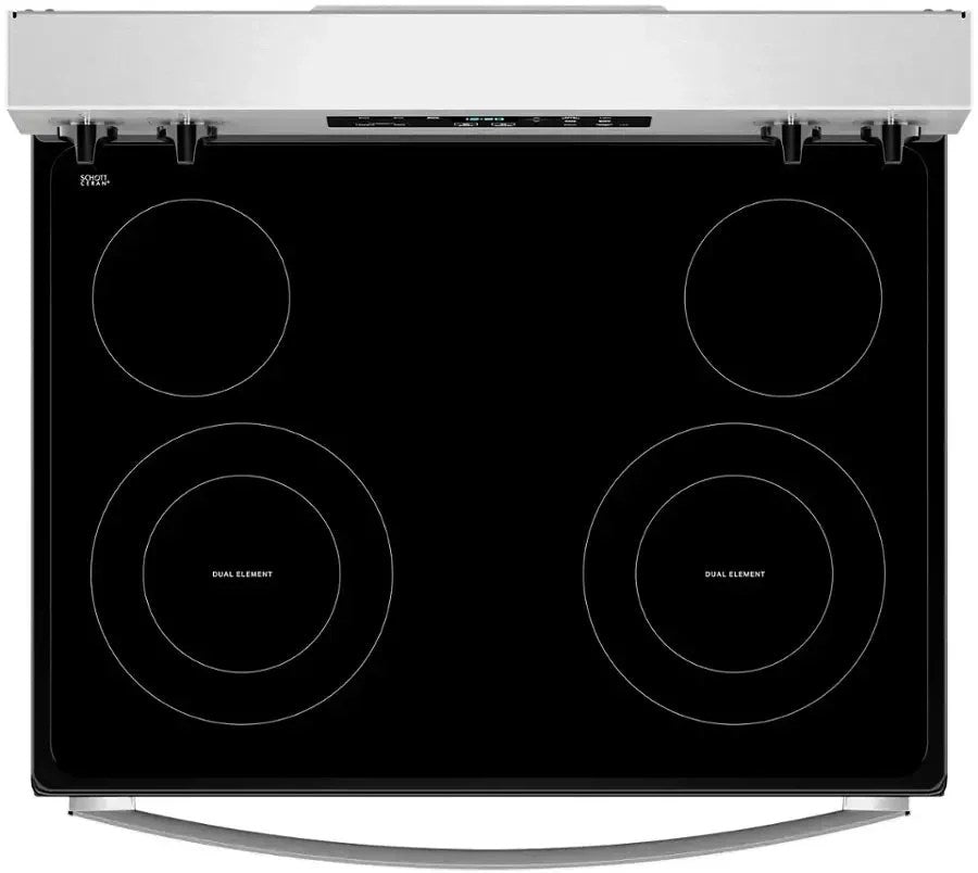 Casavibeo Whirlpool electric range with four burners and digital control panel, stainless steel finish, and oven door.