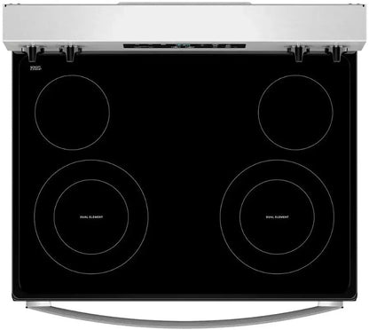 Casavibeo Whirlpool electric range with four burners and digital control panel, stainless steel finish, and oven door.