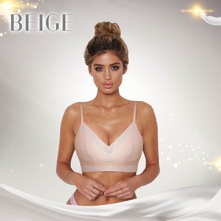 Women's wireless lifting lace bra by BowLift, low-back seamless and strapless, showing soft lace fabric and supportive design.
