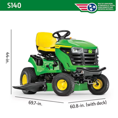 John Deere S140 48-inch riding lawn tractor with 22 HP V-twin engine and hydrostatic transmission, shown in a yard setting.
