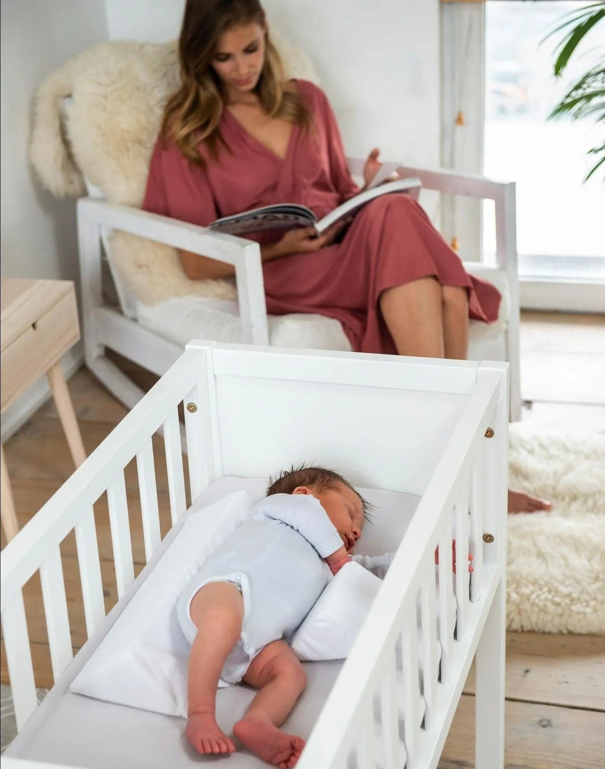 White Belro Baby Anti-Roll Wedge Pillow for side sleeping support, designed to keep infants comfortable and safe during rest.