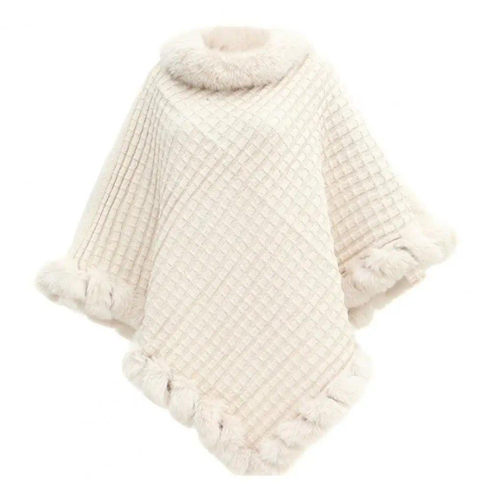 Beige faux fur shawl cloak for women by Belro, stylish and cozy outerwear for elegant winter or fall outfits.