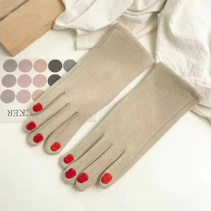 Beige Belro touch screen winter gloves with nail polish design, showcasing stylish accessory for cold weather.