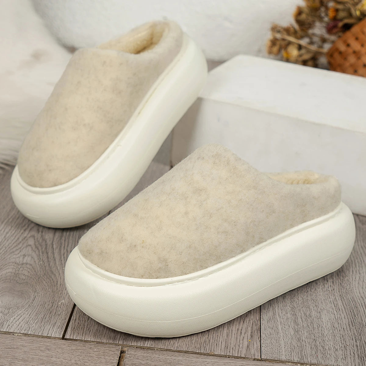 Beige Belro warm plush indoor winter slippers for women with soft, cozy interior and slip-on design.