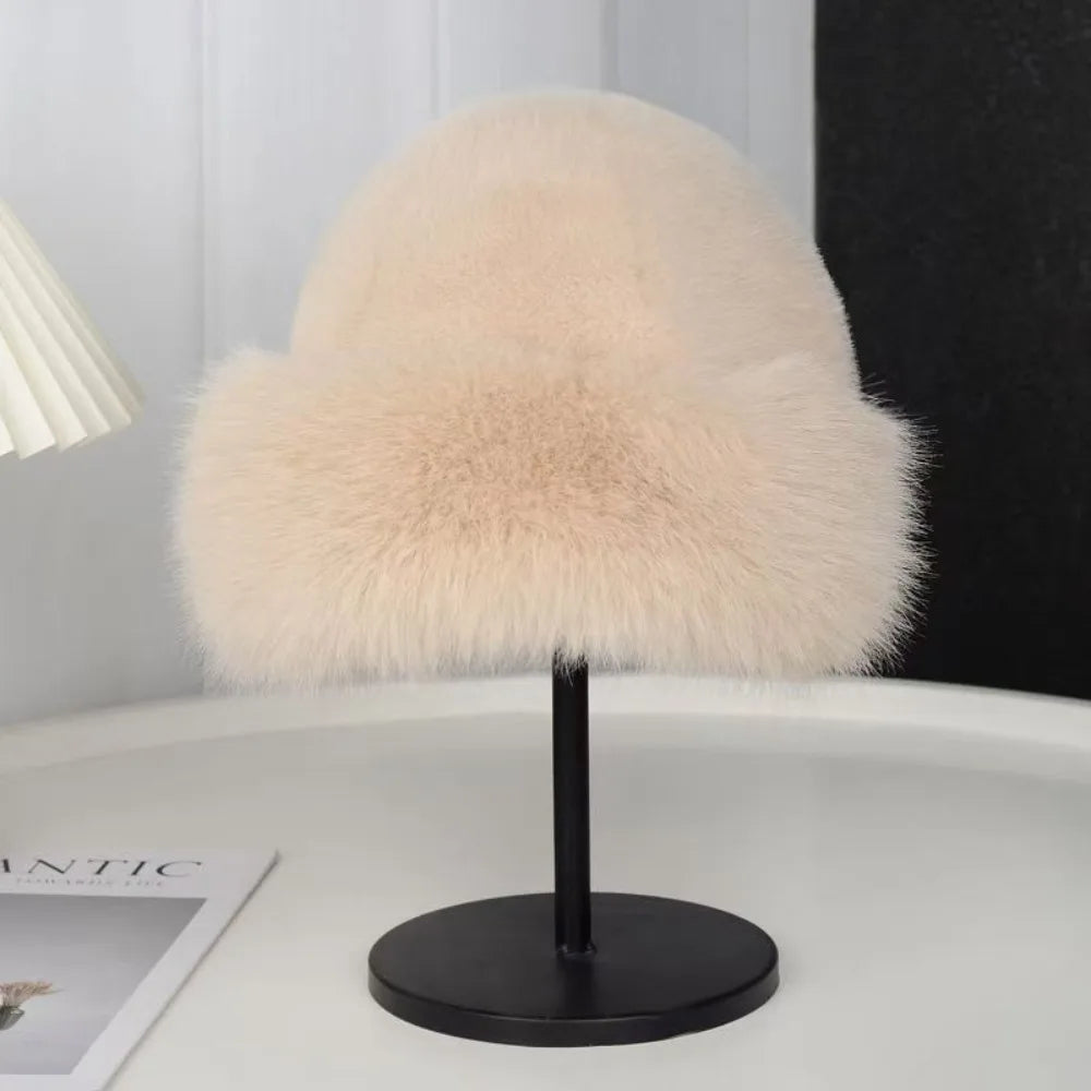 Beige women's plush winter bucket hat by Belro, cozy and warm accessory with soft fabric and wide brim.