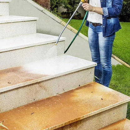Belro high-pressure washer spray nozzle attached to a water hose for car washing, showcasing durable construction and adjustable spray settings.