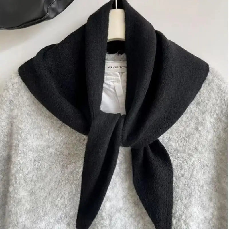 Black Korean style knitted scarf for women, stylish winter accessory by Belro featuring cozy, textured knit fabric.