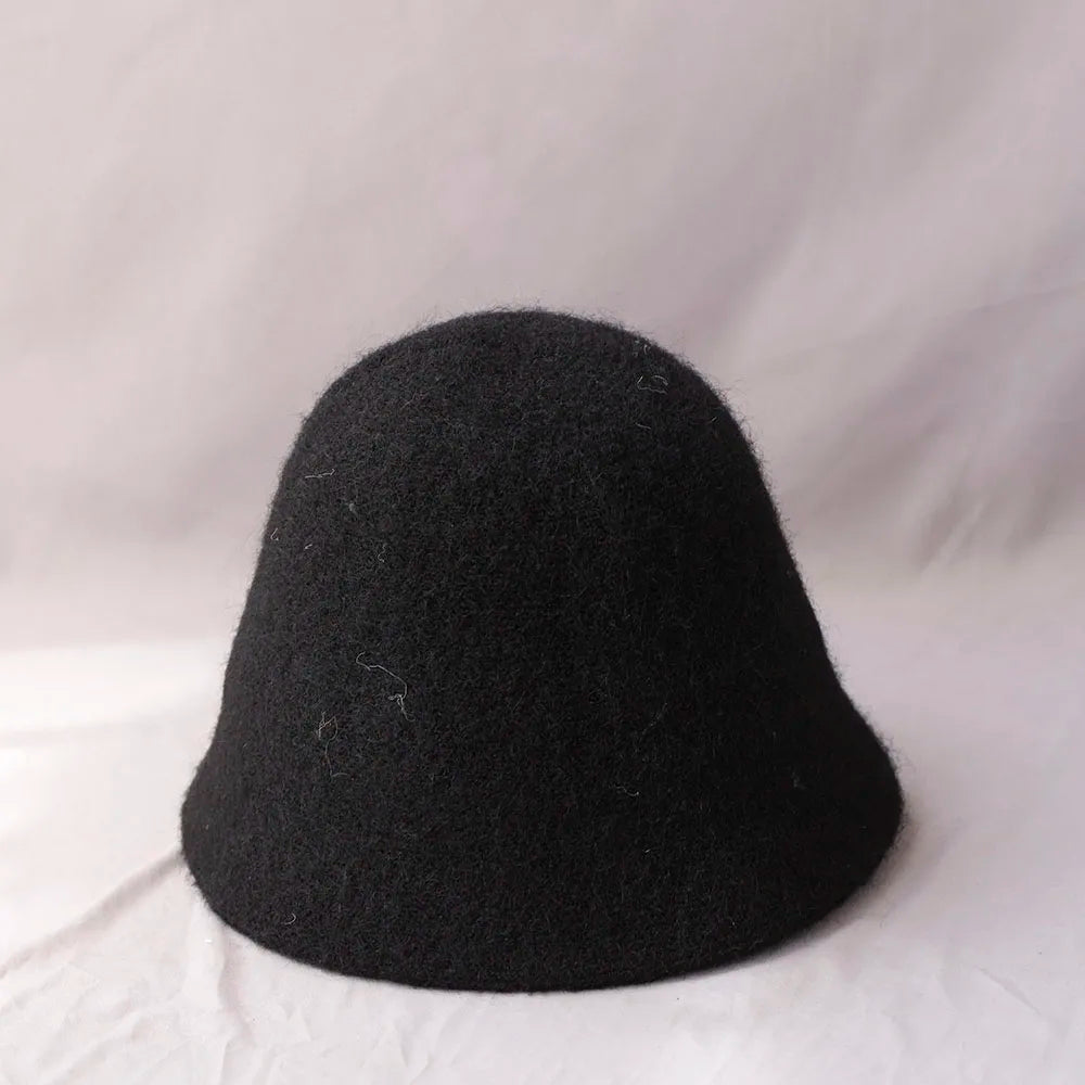 Black women's winter wool bucket hat by Belro with a cozy, wide-brim design perfect for cold weather accessories.