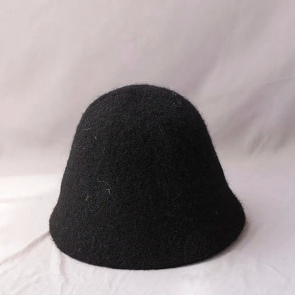 Black women's winter wool bucket hat by Belro with a cozy, wide-brim design perfect for cold weather accessories.