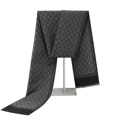 Black Belro luxury cashmere feel winter scarf draped over a mannequin, showcasing soft, elegant scarf for cold weather accessories.