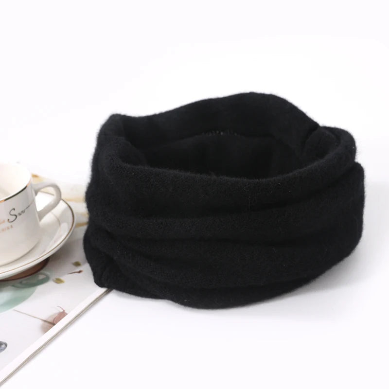 Black Merino Wool face mask and winter scarf by Belro, soft, warm clothing accessories for cold weather comfort.