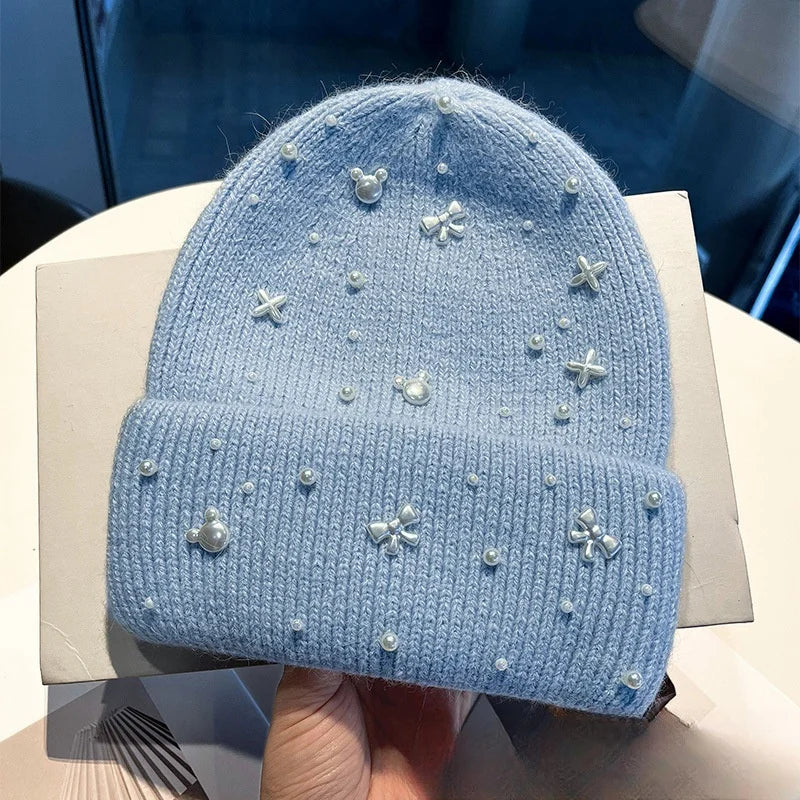 Belro blue knit beanie winter hat with pearl accents, cozy accessories for cold weather, stylish and warm headwear.