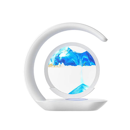 Blue Belro 3D Sand Art Table Lamp with wireless charger, featuring a glowing sand art display and charging pad for electronic devices.