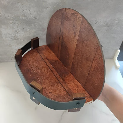 Rustic bourbon whiskey barrel shelf by Belro for home bar decor, made from reclaimed wood with metal accents.