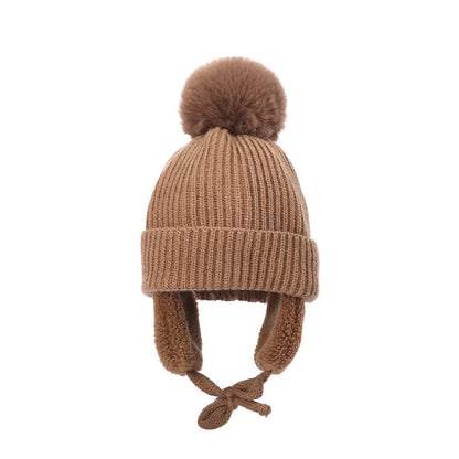 Brown kids knit beanie winter hat with earflaps and pom-pom, soft and cozy accessory by Belro for cold weather.