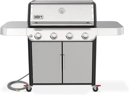 Casavibeo Weber Genesis S-415 natural gas grill with four burners, stainless steel lid, and side shelves for outdoor cooking.