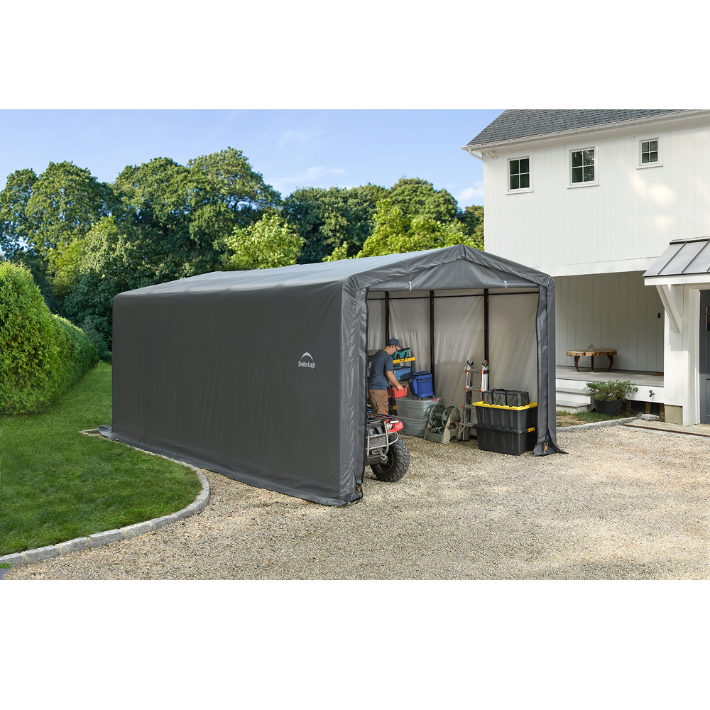 Tan ShelterTube garage with 10x14x8 dimensions, wind and snow-load rated, constructed by Casavibeo, shown in the image.