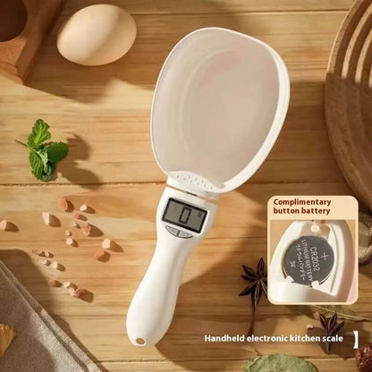 Digital measuring spoon scale by Mivoza Deutschland showing a compact kitchen tool with digital display for precise portioning.