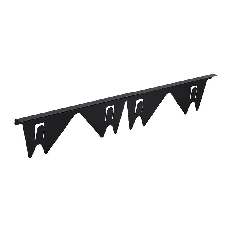 Belro stove gap cover placed between kitchen countertop and stove, protecting against crumbs and spills in a modern kitchen setting.