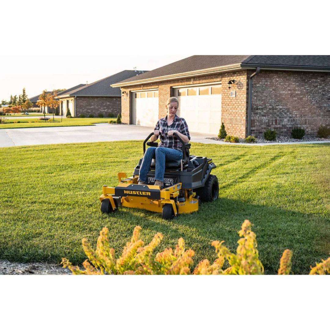 Casavibeo Hustler Raptor X Zero-Turn Mower with 42-inch cutting deck, Kawasaki FR600 18hp engine, shown in a yard setting.