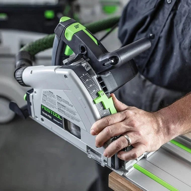 Casavibeo plunge saw TS 55 by Festool with 1200W motor, showing the saw blade and adjustable cutting guide in use.