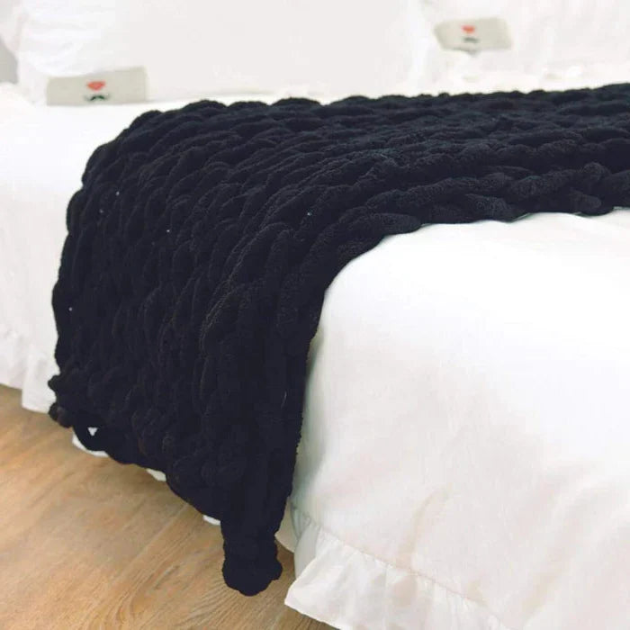 Belro chenille chunky knitted blanket with thick cable knit design, perfect for cozying up on a couch or bed.