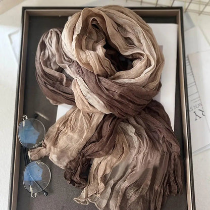 Soft gradient cotton shawl by Belro, a cozy winter scarf for ladies, featuring warm tones and lightweight, breathable fabric.