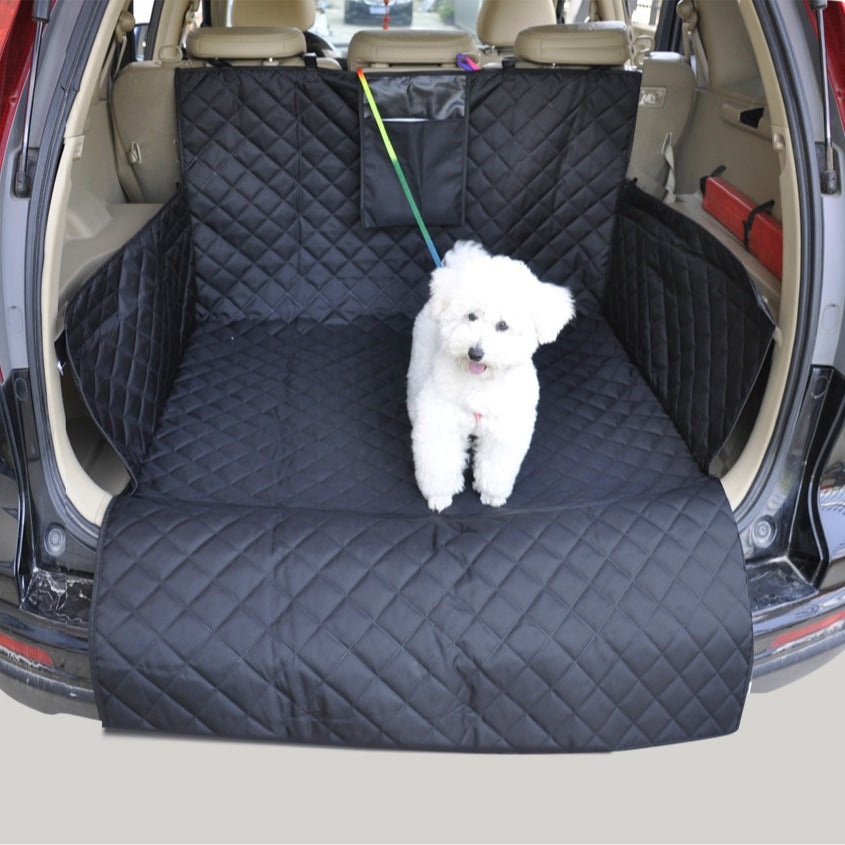 Belro dog trunk seat cover for SUVs, waterproof automotive accessory, shown installed in the rear cargo area with a dog sitting on it.