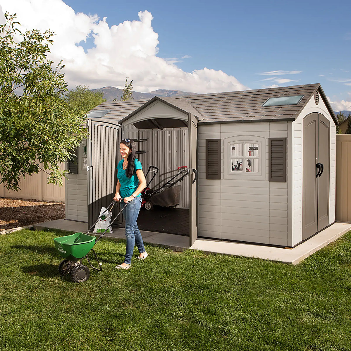 Casavibeo Lifetime 60079 outdoor storage shed in desert sand, 15 ft. by 8 ft. with dual entry doors, weather-resistant and durable.