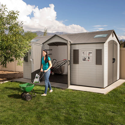 Casavibeo Lifetime 60079 outdoor storage shed in desert sand, 15 ft. by 8 ft. with dual entry doors, weather-resistant and durable.