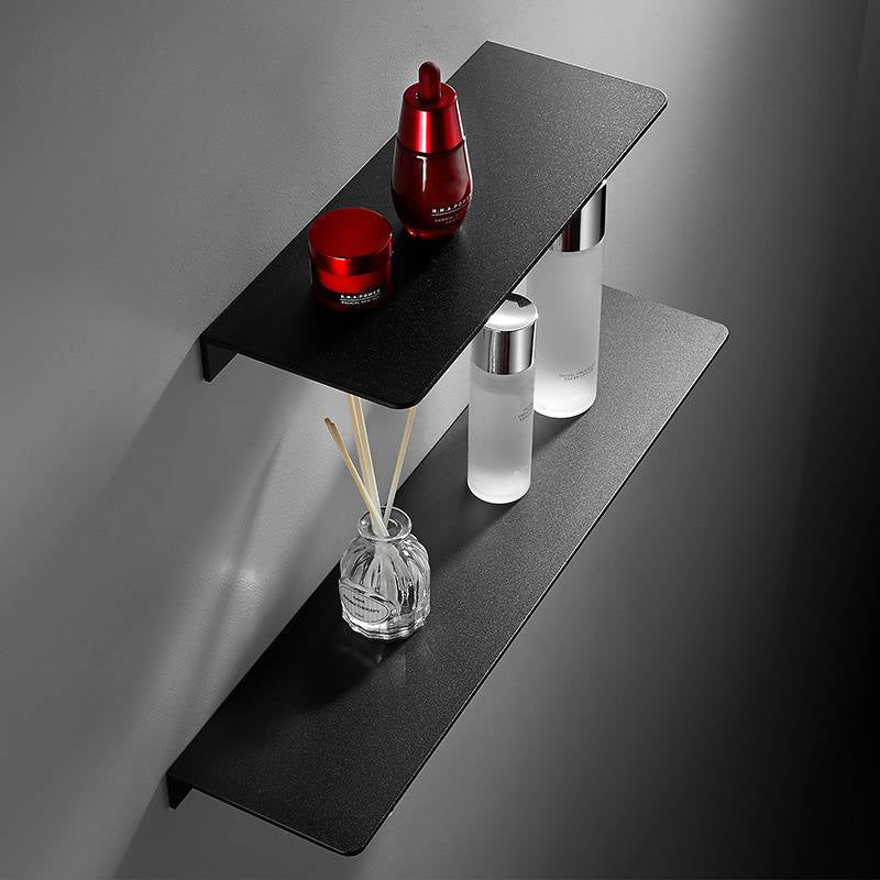 Belro floating shelves mounted on a wall in a home interior, showcasing sleek wooden design for stylish storage and display.