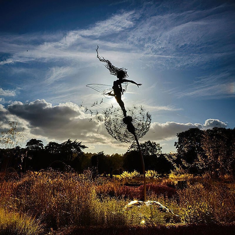 Steel garden fairy statue by BowLift, depicting a dancing fairy with weather-resistant outdoor decor in a detailed, artistic design.