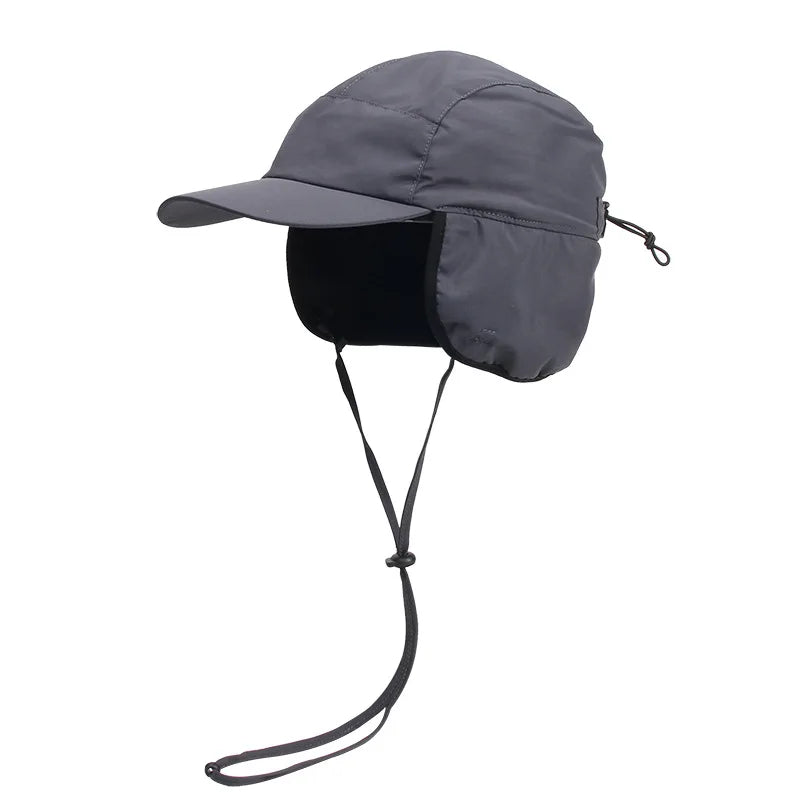 Dark gray Belro winter bomber hat with ear flaps and plush lining, designed for warmth and cozy winter accessories.