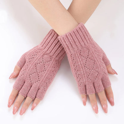 Dark pink soft knit fingerless gloves for winter by Belro, close-up of cozy, textured gloves perfect for cold weather accessories.