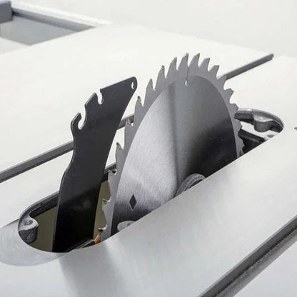 Casavibeo Grizzly G0771Z 10-inch 2 HP hybrid table saw with T-shaped fence and safety guard in a workshop setting.