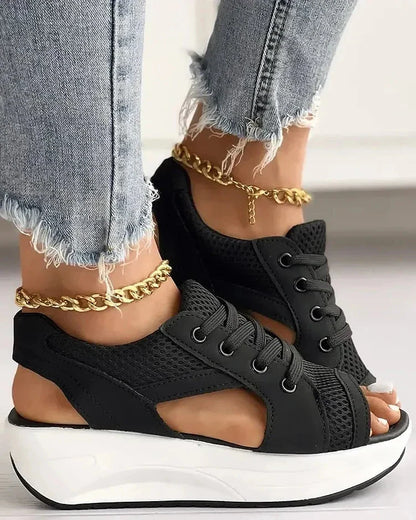 Belro contrast paneled cutout lace-up muffin sandals featuring mixed materials and chunky sole, perfect for casual summer wear.