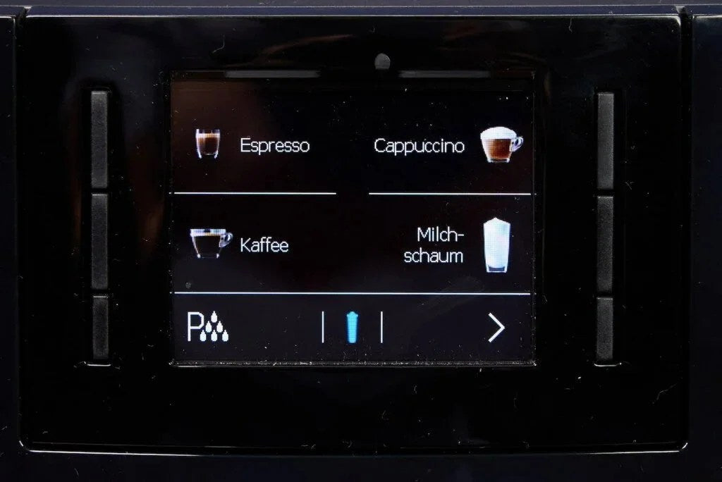 Casavibeo Jura E6 automatic coffee machine with sleek design, digital display, and integrated milk frother for fresh espresso brewing.