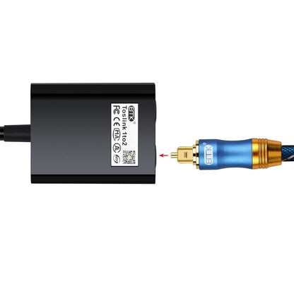 Black GETDECO digital optical audio splitter cable splits one fiber optic signal into two outputs for home theater systems.