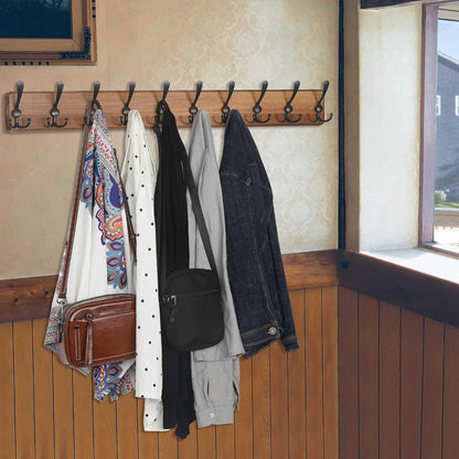 Wooden wall-mounted coat rack with 10 hooks, ideal for hanging jackets and coats, by Belro.