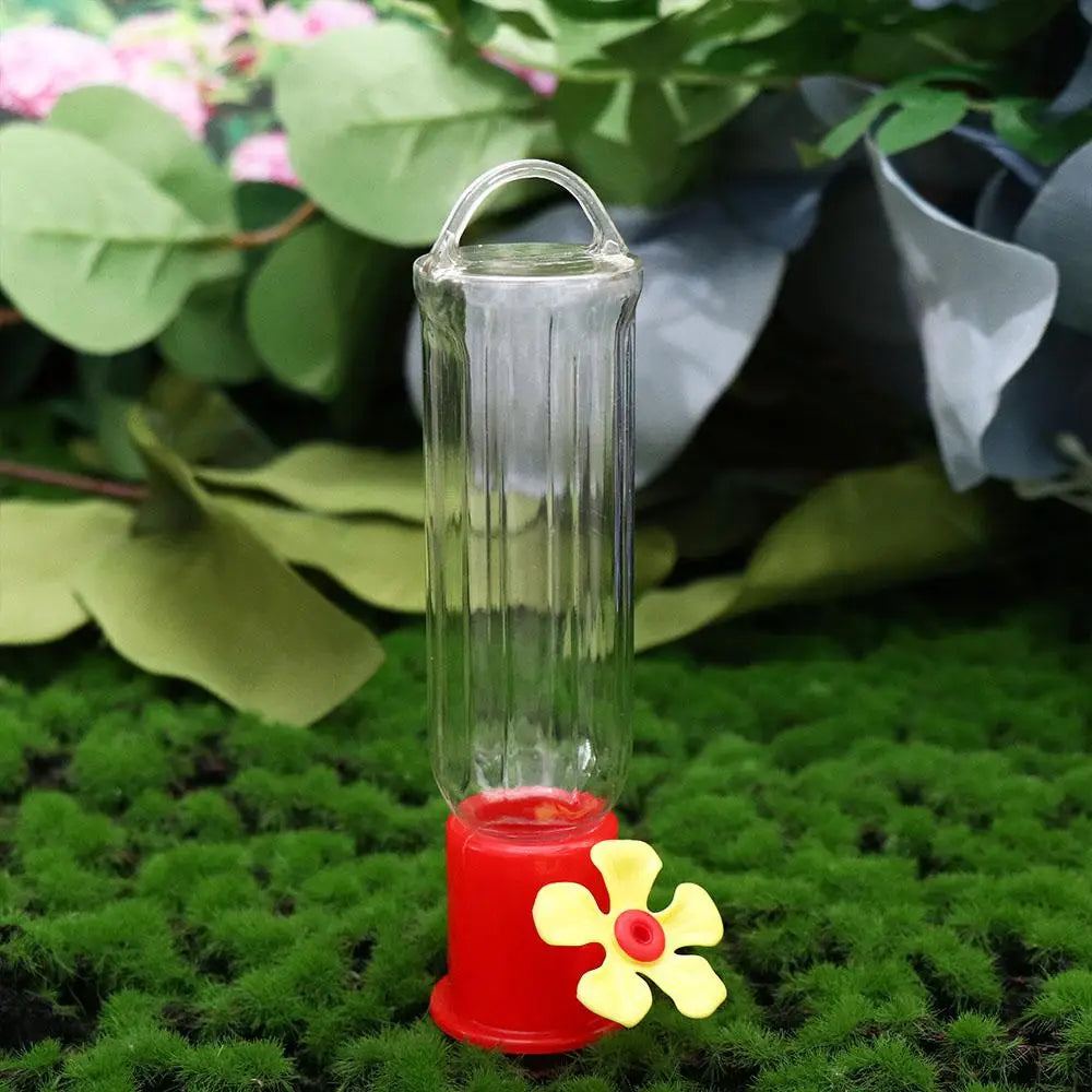 Belro leak-proof plastic hummingbird feeder with bright red accents, designed for easy refilling and attracting hummingbirds.