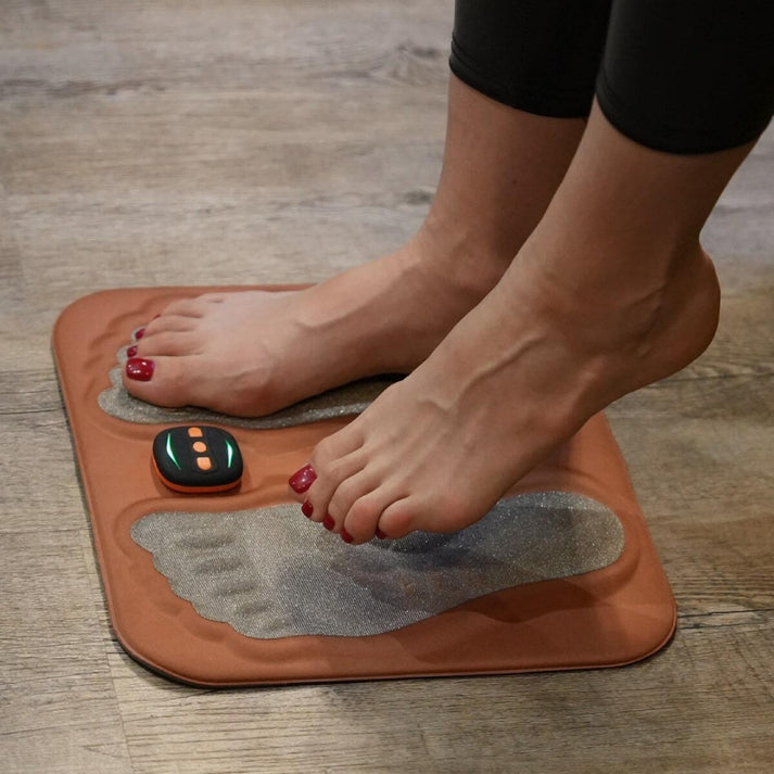 Mivoza Deutschland foot stimulator for neuropathy pain relief, portable and rechargeable device with foot pads and control panel.