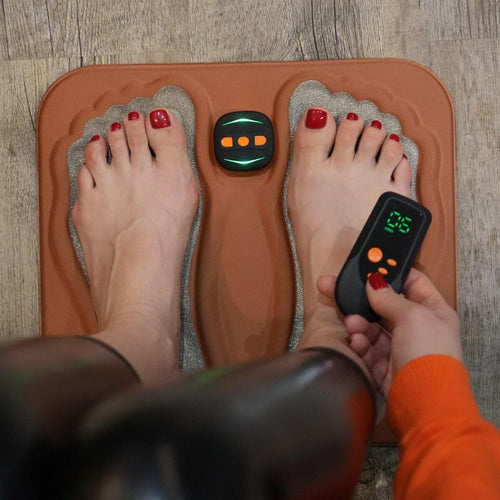 Mivoza Deutschland foot stimulator for neuropathy pain relief, portable, rechargeable device with interface for nerve stimulation therapy.