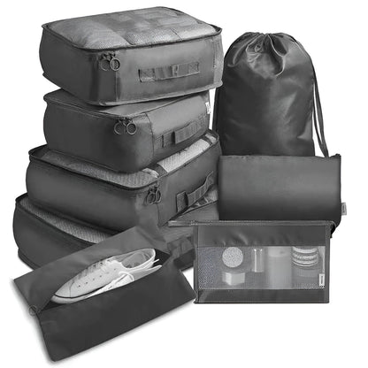 Set of seven Belro packing cubes for travel, organized in various sizes, designed for efficient packing and luggage organization.
